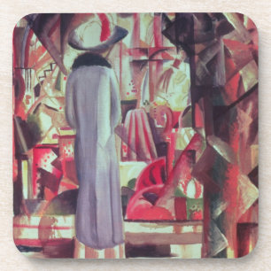 Woman in front of a large illuminated window coaster