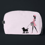 Woman in pink walking black poodle dopp kit<br><div class="desc">Vintage woman with a beret walking a black poodle.</div>