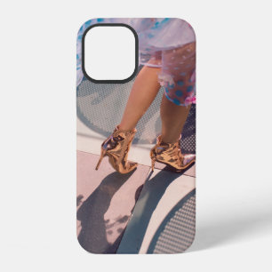 Woman in white pink and green floral skirt and bro iPhone 12 case