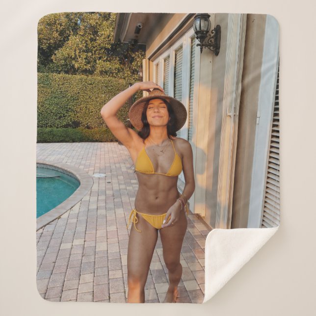 Woman in yellow bikini standing on brown brick flo sherpa blanket (Front)