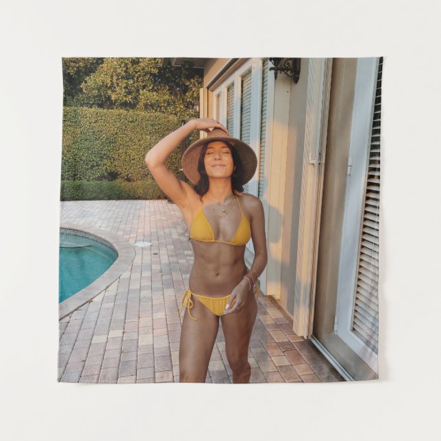 Woman in yellow bikini standing on brown brick flo tapestry (Front)