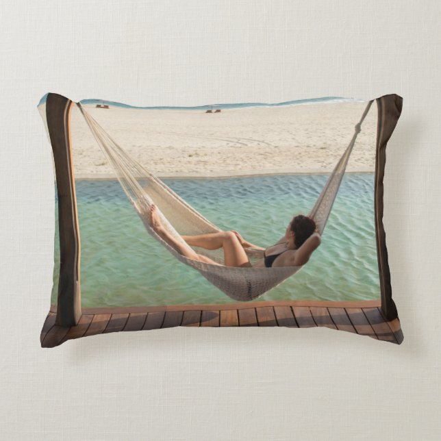 Woman Laying On A Hammock At A Small Hotel Decorative Pillow (Front)