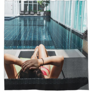 Woman laying on brown chaise lounge