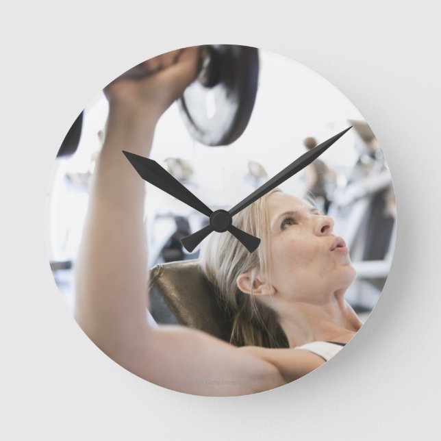 Woman Lifting Weights Round Clock (Front)