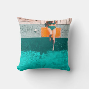 Woman lying beside swimming pool in the morning throw pillow
