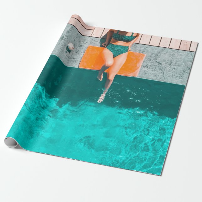 Woman lying beside swimming pool in the morning wrapping paper (Unrolled)