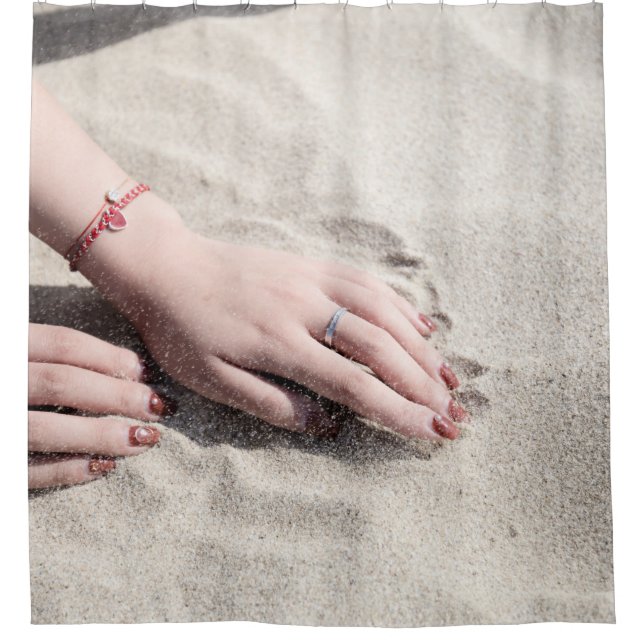 Woman lying on white sand (Front)