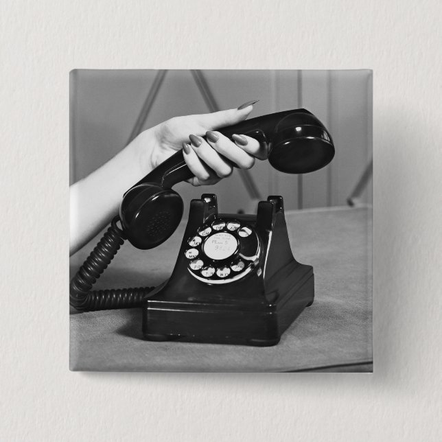Woman picking up phone close up of hand 2 inch square button (Front)