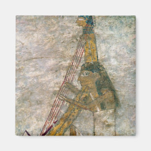 Woman playing an arched harp magnet