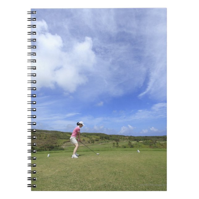 Woman playing golf notebook (Front)