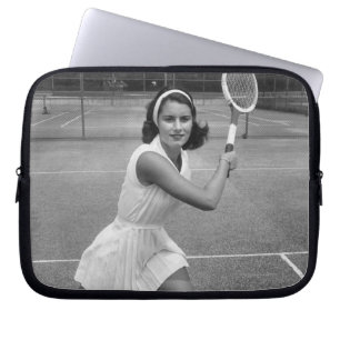 Woman playing tennis laptop sleeve