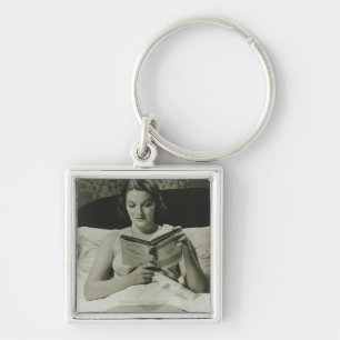Woman Reading Book Keychain