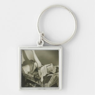 Woman Reading Magazine Keychain