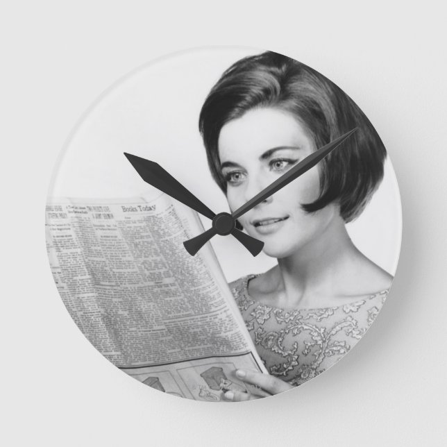 Woman Reading Newpaper Round Clock (Front)
