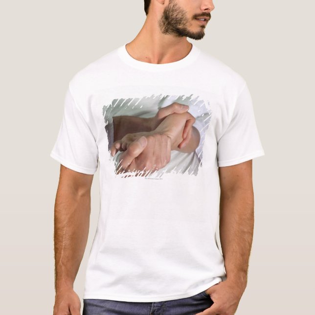 Woman receiving foot massage 2 T-Shirt (Front)