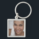 Woman scrubbing her face with cloth keychain<br><div class="desc">AssetID: 127825260 / {GretaMarie} / Woman scrubbing her face with cloth</div>