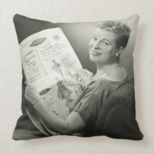 Woman Sitting in Chair Throw Pillow