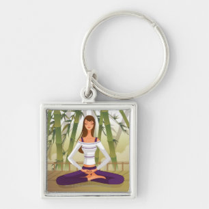 Woman sitting in lotus position, meditating keychain