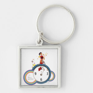 Woman sitting on a clock and holding a tea cup keychain