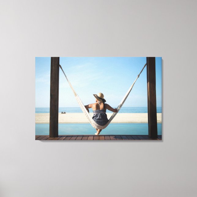Woman Sitting On A Hammock At A Small Hotel Canvas Print (Front)
