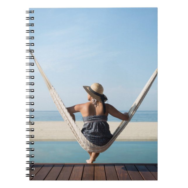 Woman Sitting On A Hammock At A Small Hotel Notebook (Front)