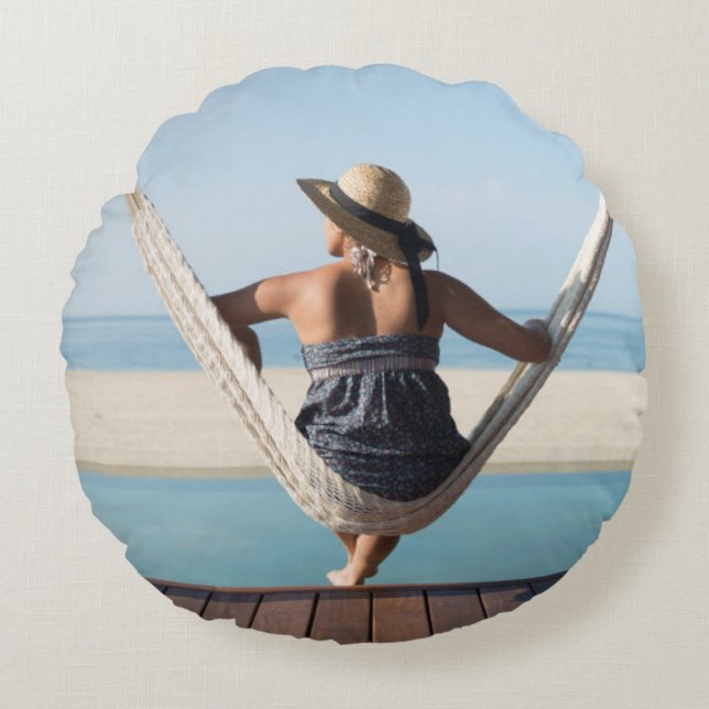Woman Sitting On A Hammock At A Small Hotel Round Pillow (Front)