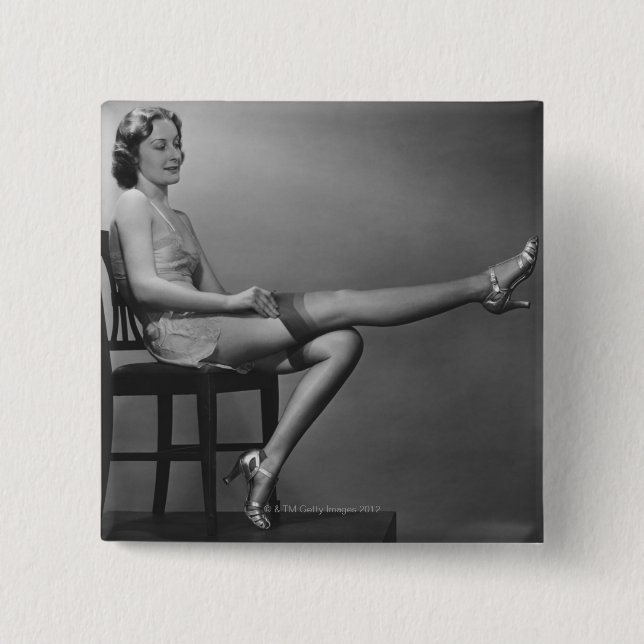 Woman Sitting on Chair 2 Inch Square Button (Front)