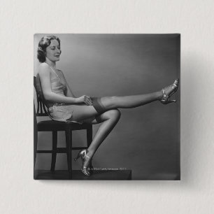 Woman Sitting on Chair 2 Inch Square Button