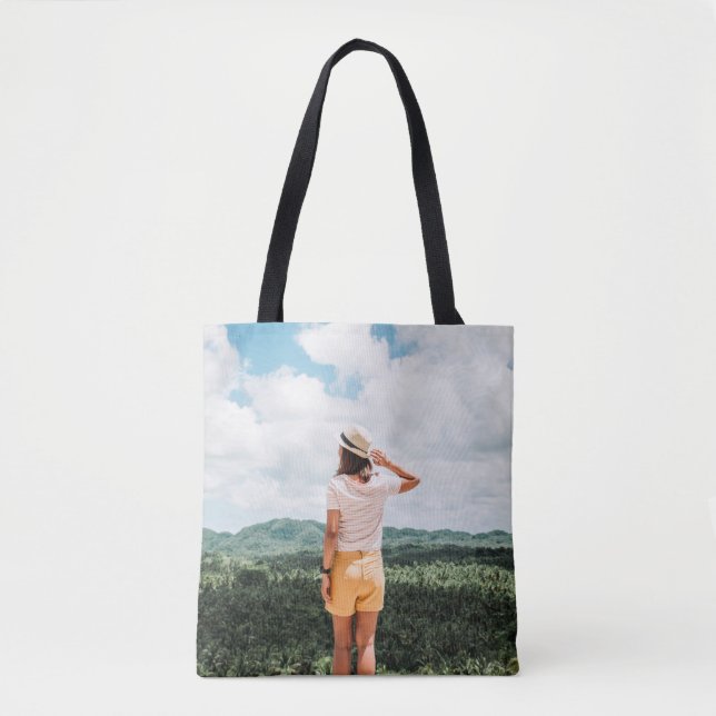 Woman standing near trees tote bag (Front)