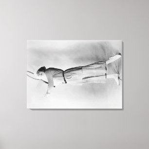Woman Swinging Tennis Raquet Canvas Print