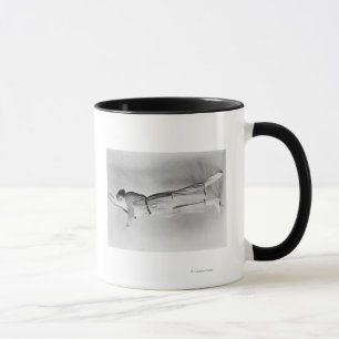 Woman Swinging Tennis Raquet Mug