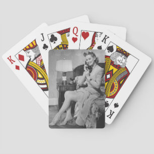 Woman Talking on Phone Playing Cards
