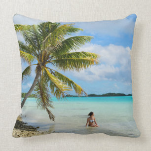 Woman under a palm tree throw pillow