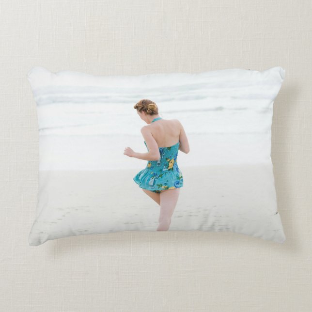 Woman walking on shore near beach accent pillow (Front)