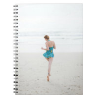 Woman walking on shore near beach
