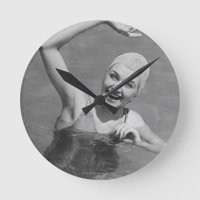 Woman Waving Round Clock (Front)