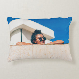 Woman wearing black sunglasses accent pillow
