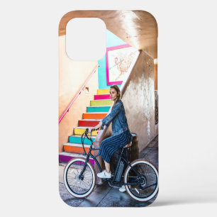 Woman wearing blue denim jacket and shorts riding  iPhone 12 case
