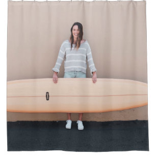 Woman wearing grey and white stripe long-sleeved s