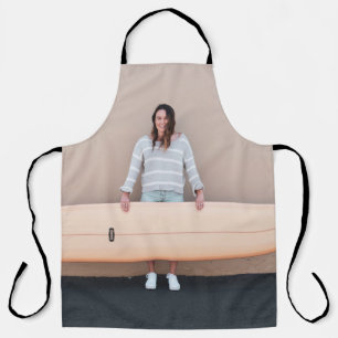 Woman wearing grey and white stripe long-sleeved s apron