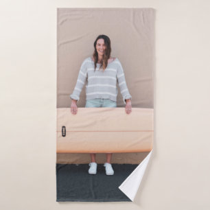 Woman wearing grey and white stripe long-sleeved s bath towel