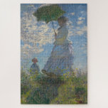 Woman with a Parasol - Madame Monet and Her Son Jigsaw Puzzle<br><div class="desc">Claude Monet,  1875
en plein air oil painting on canvas
depicts Claude Monet's wife Camille with a parasol,  standing on a grassy green hill with a blue cloudy sky in the background,  on a windy day in summer

sophisticated  boho bright bohemian chic fine art decor modern classic historical art</div>