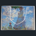 Woman with a Parasol, Monet Large Gift Bag<br><div class="desc">Oscar-Claude Monet (14 November 1840 – 5 December 1926) was a French painter, a founder of French Impressionist painting and the most consistent and prolific practitioner of the movement's philosophy of expressing one's perceptions before nature, especially as applied to plein air landscape painting. The term ""Impressionism"" is derived from the...</div>