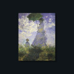 Woman with Parasol by Claude Monet, Vintage Art Canvas Print<br><div class="desc">The Stroll, Camille Monet and Her Son Jean (Woman with a Parasol) (1875) by Claude Monet is a vintage impressionist fine art family portrait painting. A mother taking a walk with her young child in a field or spring meadow. She is holding a sun umbrella and wearing a beautiful dress...</div>