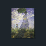 Woman with Parasol by Claude Monet, Vintage Art Canvas Print<br><div class="desc">The Stroll, Camille Monet and Her Son Jean (Woman with a Parasol) (1875) by Claude Monet is a vintage impressionist fine art family portrait painting. A mother taking a walk with her young child in a field or spring meadow. She is holding a sun umbrella and wearing a beautiful dress...</div>