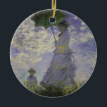 Woman with Parasol by Claude Monet, Vintage Art Ceramic Ornament<br><div class="desc">The Stroll, Camille Monet and Her Son Jean (Woman with a Parasol) (1875) by Claude Monet is a vintage impressionist fine art family portrait painting. A mother taking a walk with her young child in a field or spring meadow. She is holding a sun umbrella and wearing a beautiful dress...</div>