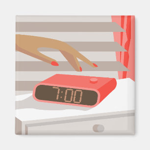 Womans hand pushing on alarm clock snooze button magnet