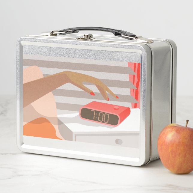 Womans hand pushing on alarm clock snooze button metal lunch box (In Situ)