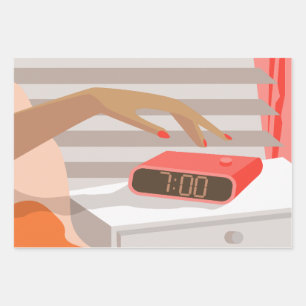 Womans hand pushing on alarm clock snooze button wrapping paper sheet