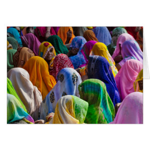 Women in colourful saris gather together